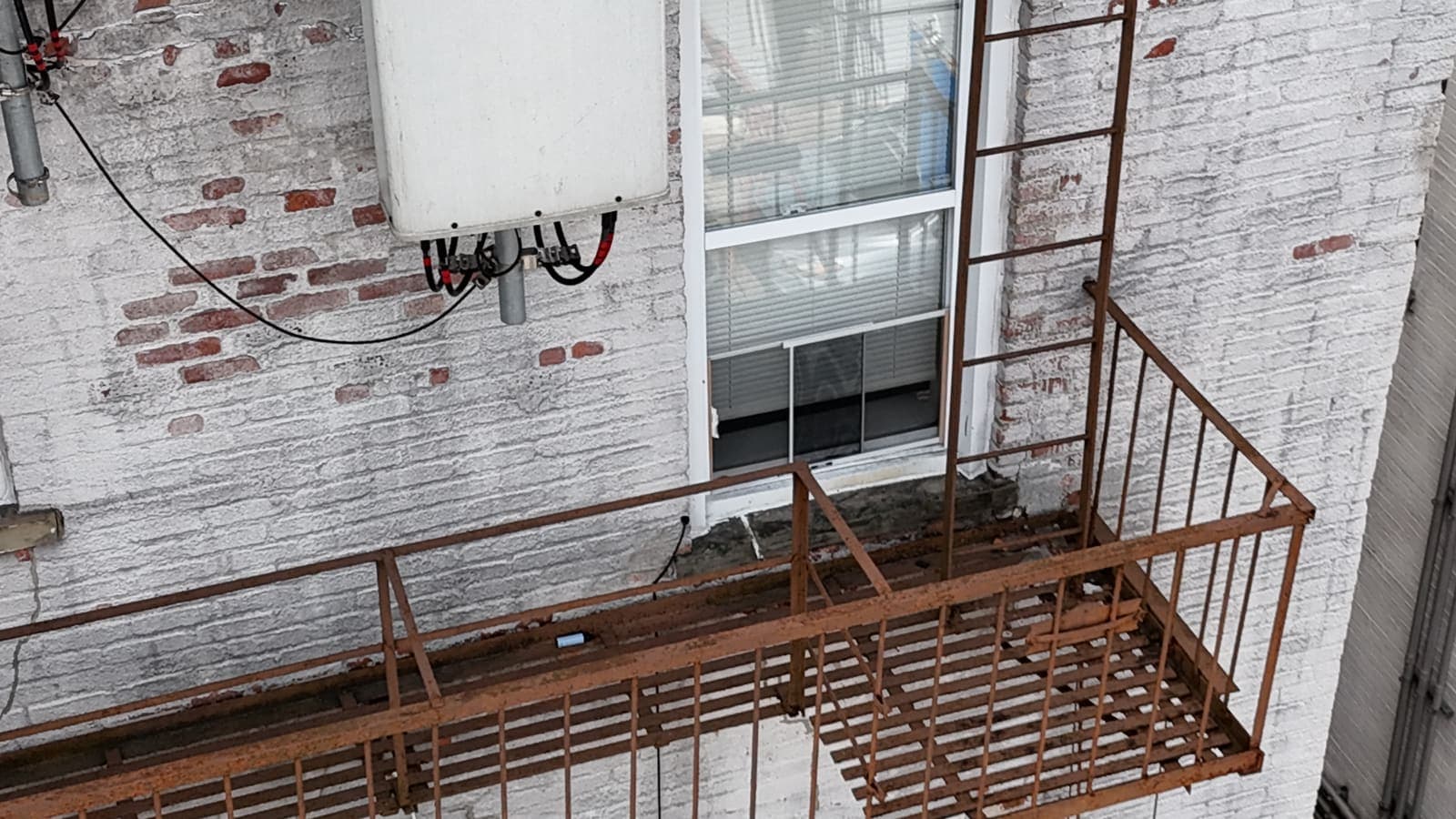 Drone field photograph, plate 050, 2026-03-11, New Jersey fire escape inspection by Oyster Fire Escape Inspections