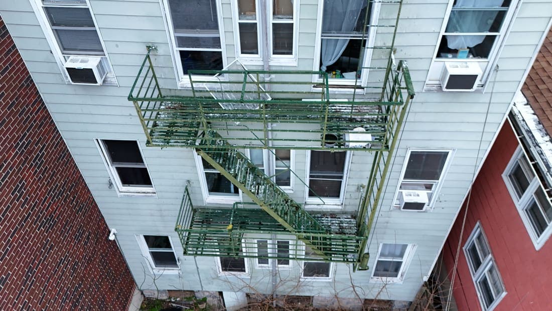 Drone field photograph, plate 080, 2026-03-23, New Jersey fire escape inspection by Oyster Fire Escape Inspections