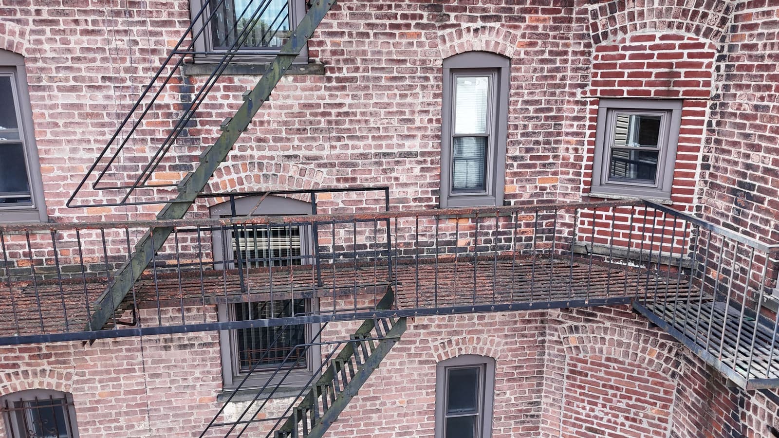 Drone field photograph, plate 083, 2026-04-15, New Jersey fire escape inspection by Oyster Fire Escape Inspections