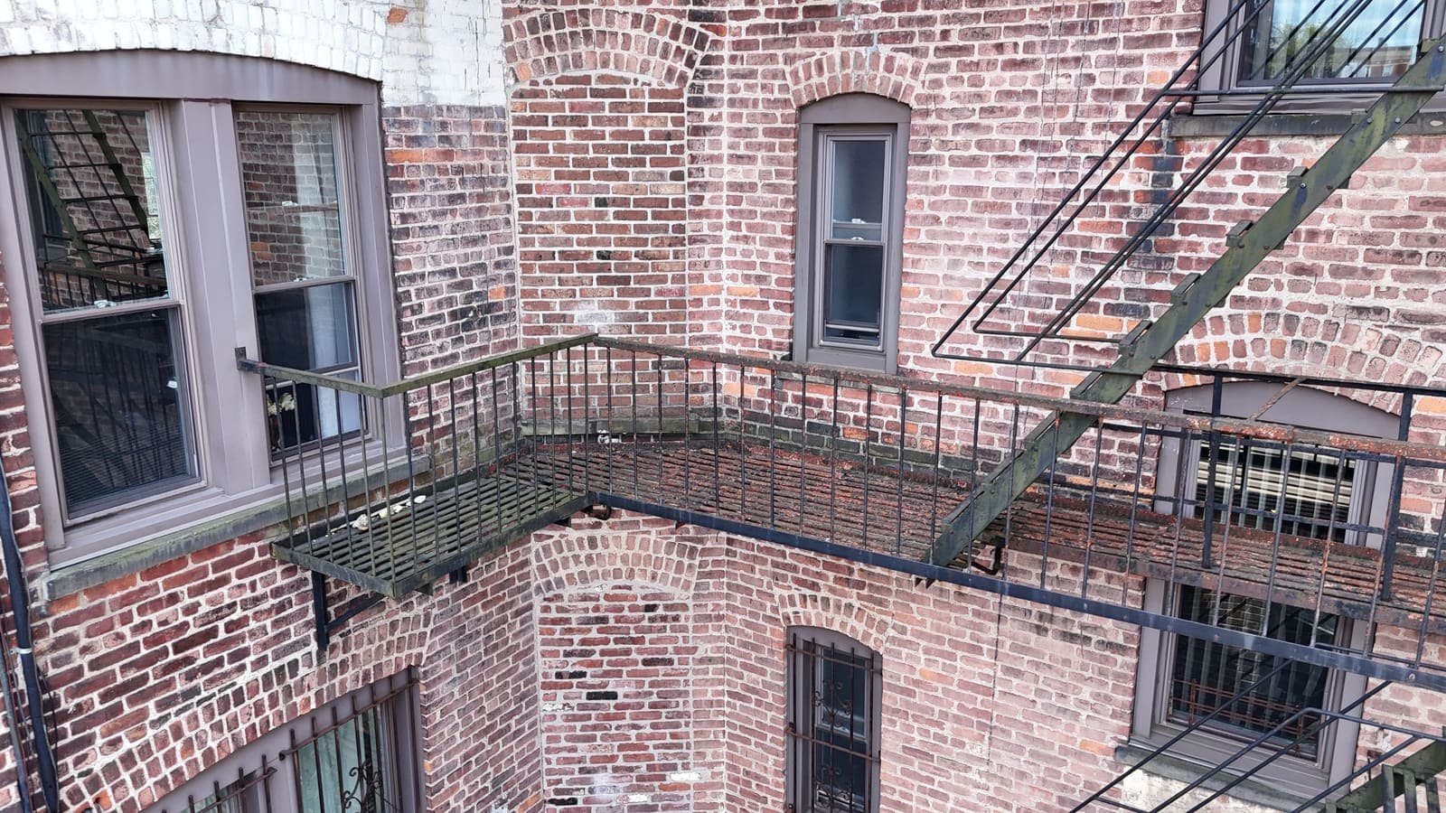 Drone field photograph, plate 084, 2026-04-15, New Jersey fire escape inspection by Oyster Fire Escape Inspections