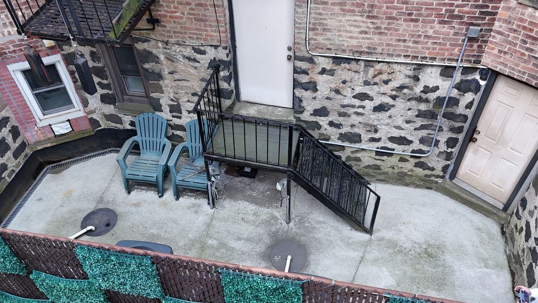 Drone field photograph, plate 087, 2026-04-15, New Jersey fire escape inspection by Oyster Fire Escape Inspections
