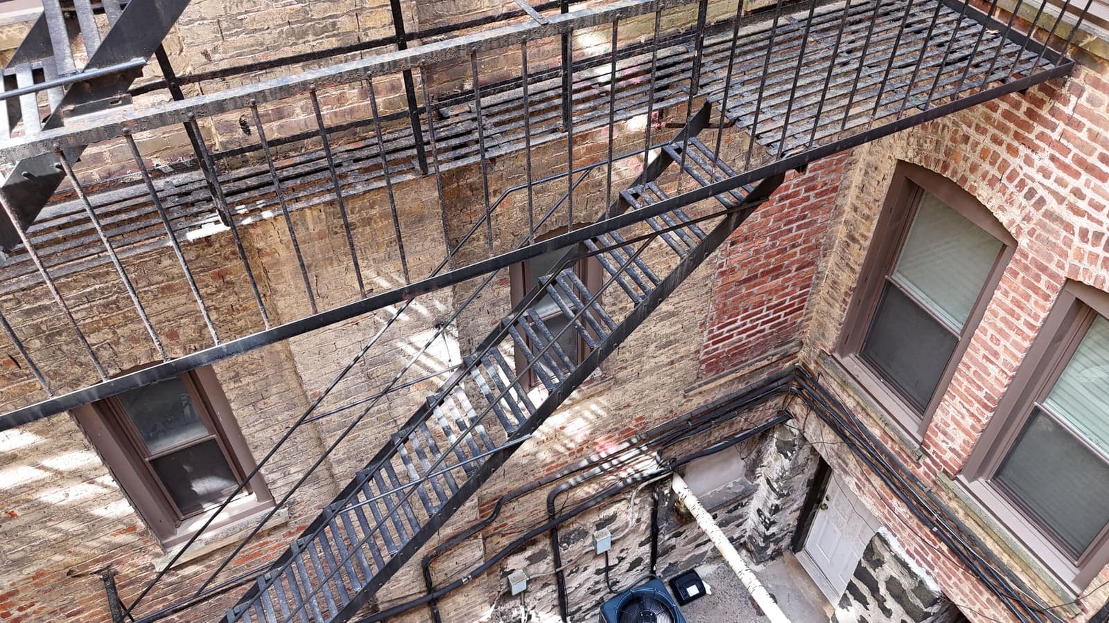 Drone field photograph, plate 091, 2026-04-15, New Jersey fire escape inspection by Oyster Fire Escape Inspections