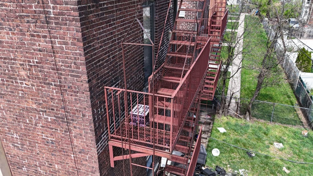 Drone field photograph, plate 103, 2026-04-16, New Jersey fire escape inspection by Oyster Fire Escape Inspections