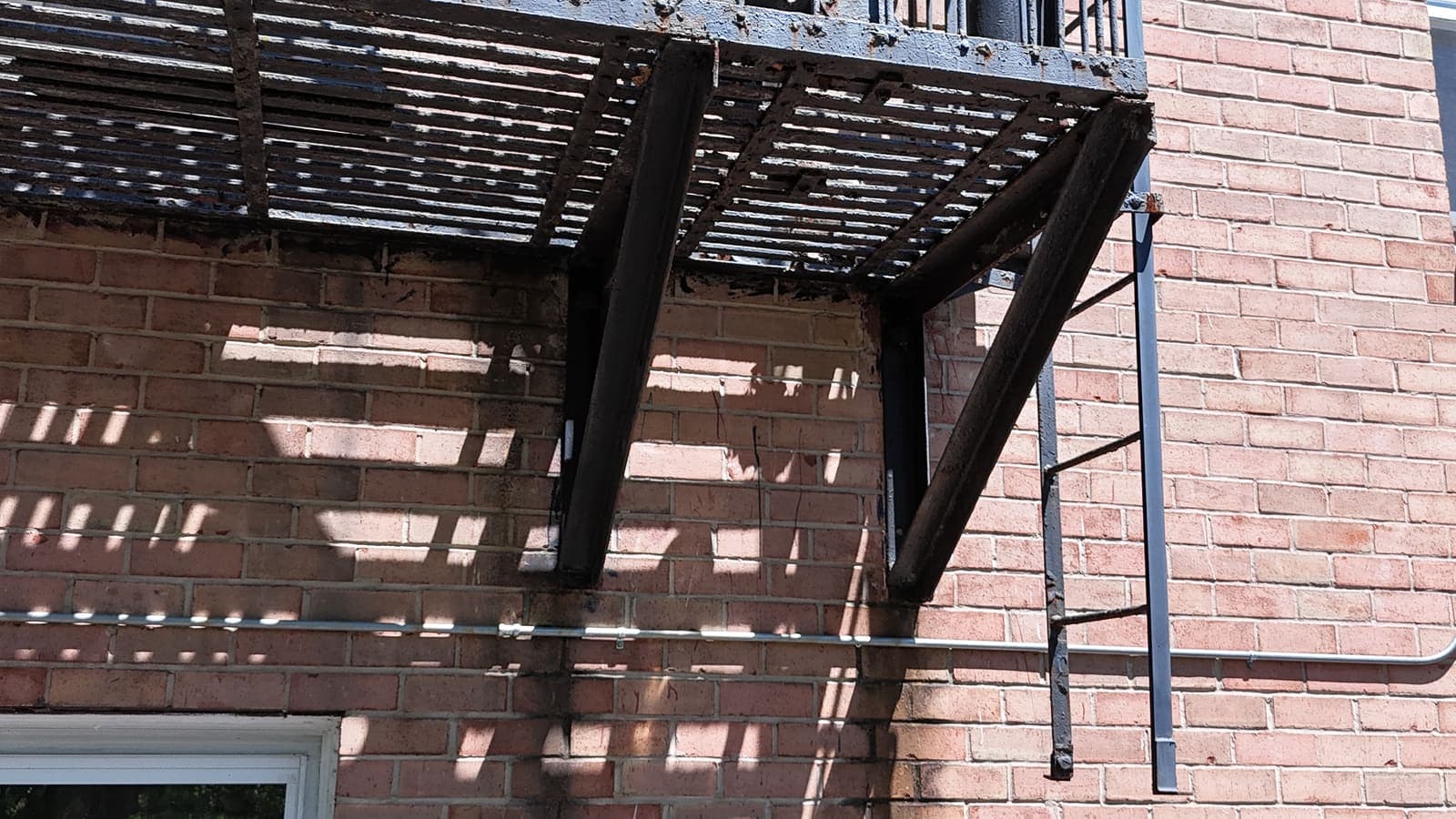 Drone field photograph, plate 119, 2026-05-07, New Jersey fire escape inspection by Oyster Fire Escape Inspections