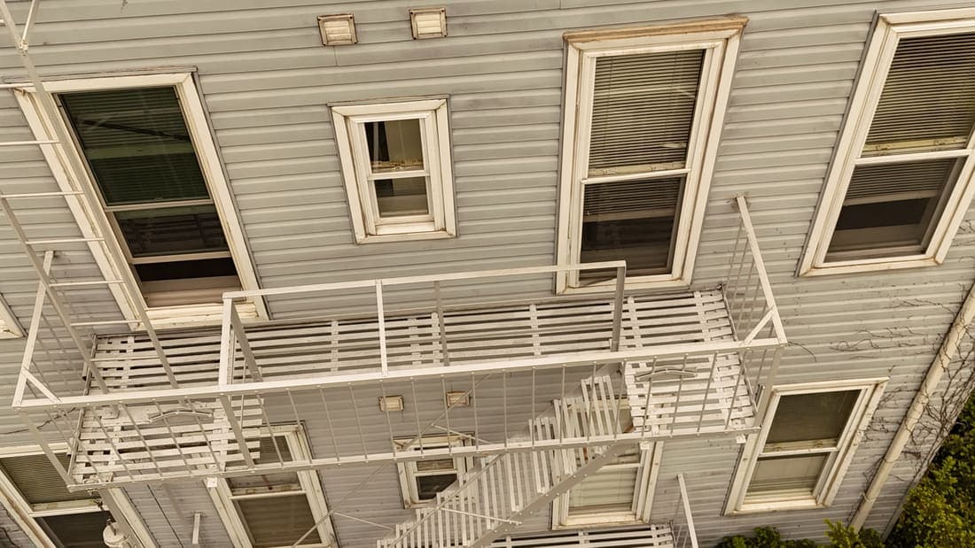 Drone field photograph, plate 129, 2026-05-11, New Jersey fire escape inspection by Oyster Fire Escape Inspections