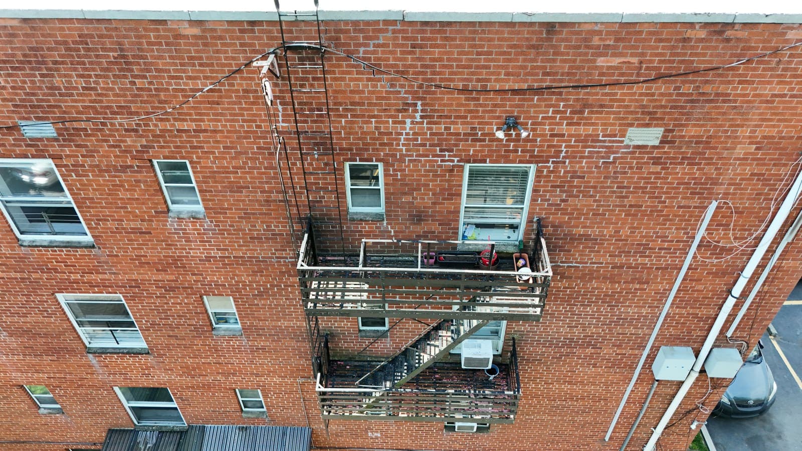 Drone field photograph, plate 139, 2026-05-19, New Jersey fire escape inspection by Oyster Fire Escape Inspections