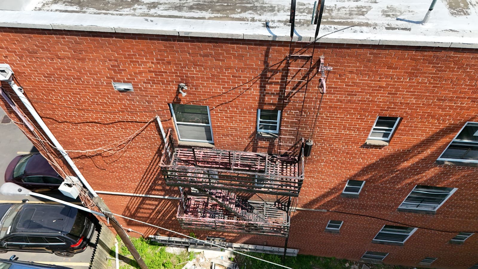 Drone field photograph, plate 140, 2026-05-19, New Jersey fire escape inspection by Oyster Fire Escape Inspections